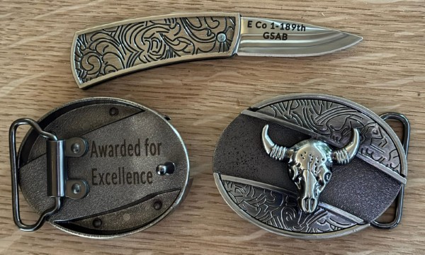 Laser engraved knife buckle